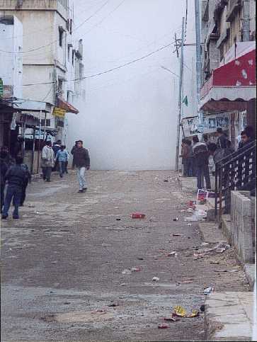 Nothing could be seen from the market street, it was too dangerous to approach the tank through the smoke.