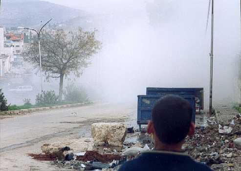 From near Jacobs Well we could make out the tank through the smoke.