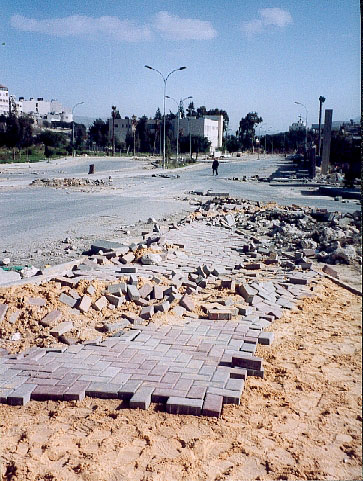 Newly laid pavements were maliciously destroyed by the tanks on their way to the Old City. At least this time they left the street lights standing.