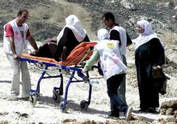 Prevented from reach the village with his ambulance, paramedic driver Firaz has to go and return on foot.