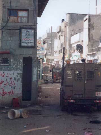 Jeeps swarming in to Balata Camp.