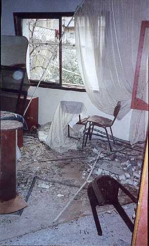 The force of the explosion had damaged houses for a considerable distance, blowing in the windows and devastating the interiors while the people were still inside.
