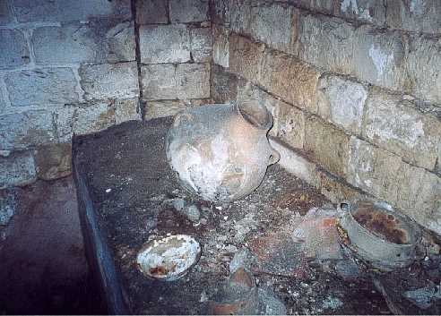 I was able to climb down and enter the ancient kitchen through the newly exposed door.