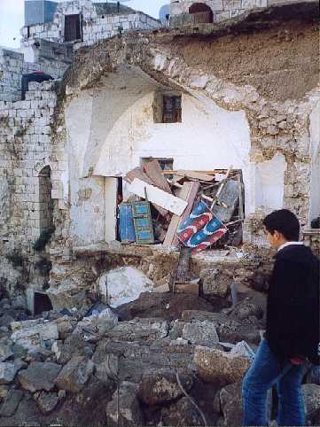 Wreckage from the Sharkh house was used to temporally secure and waterproof the adjacent house.